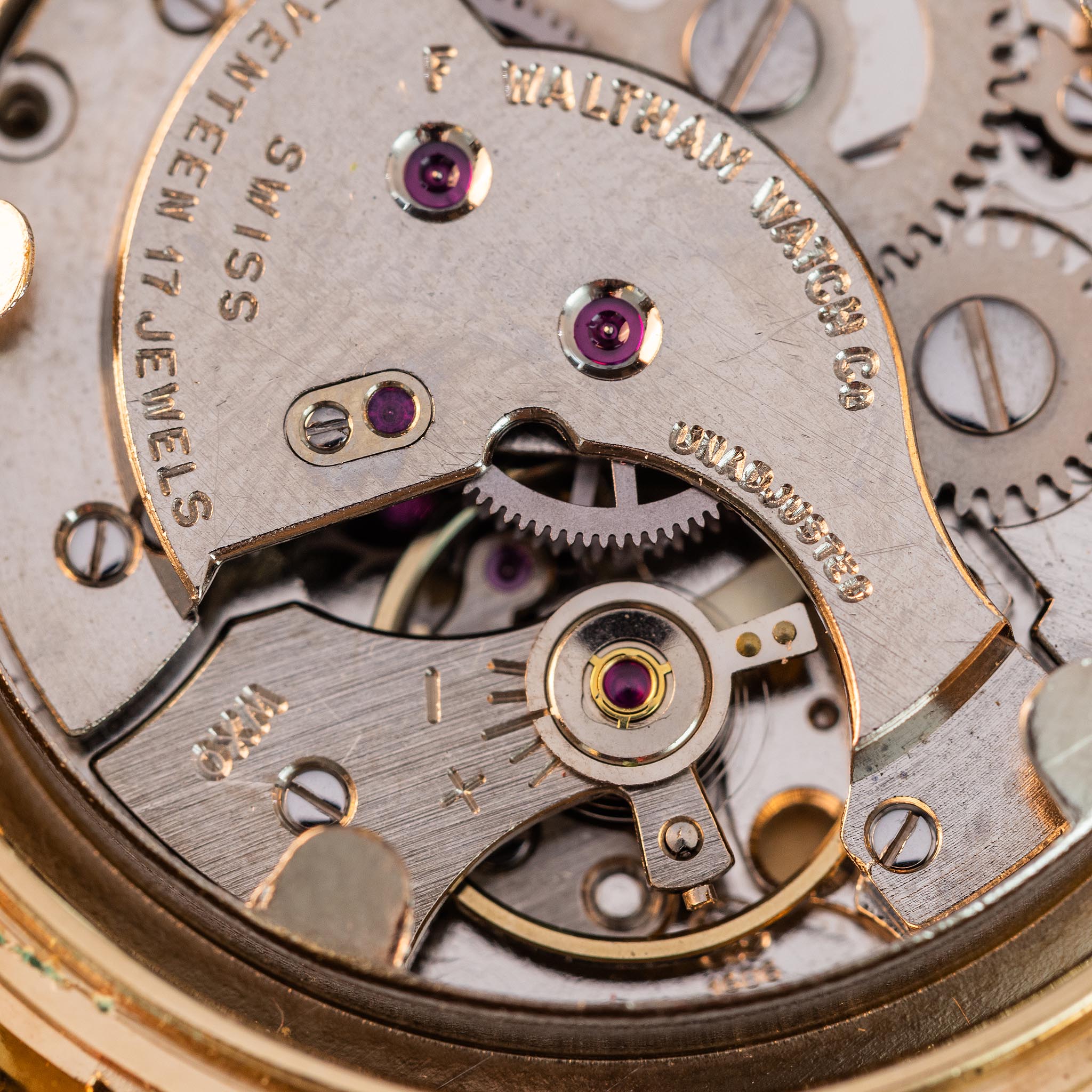 Close-up of the signed Swiss Waltham manual-wind movement marked seventeen 17 jewels.
